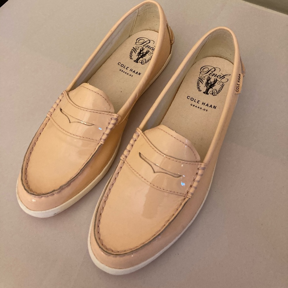 Beautiful peach colored cole Haan loafers